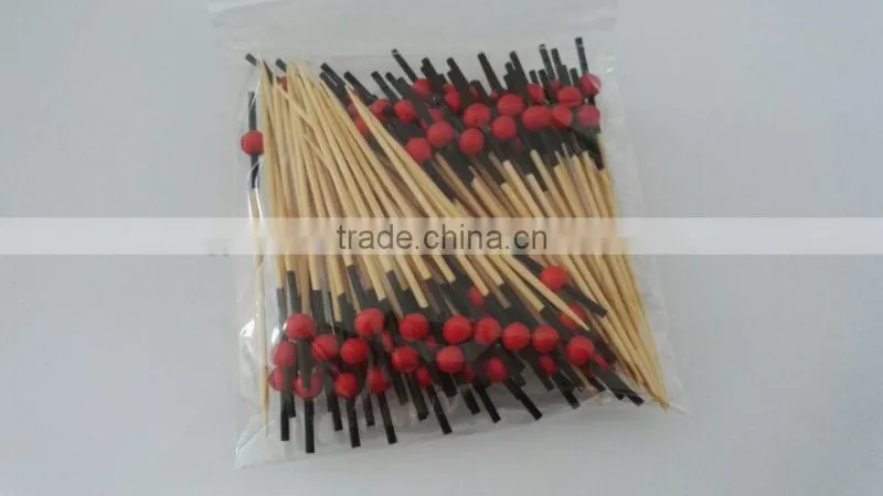 Cocktail sticks skewer with red bead