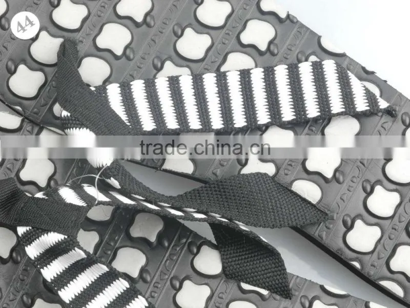 Men's black and white flip flops stock shoe