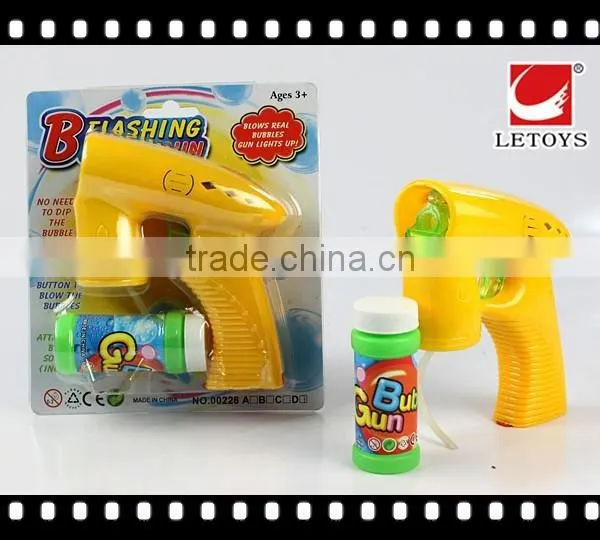 flashing musical solid color bubble gun with 1 bottle bubble water