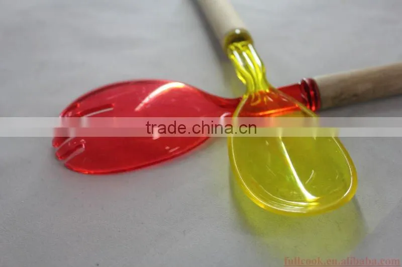 Colorful plastic salad spoon and fork w/wooden handle