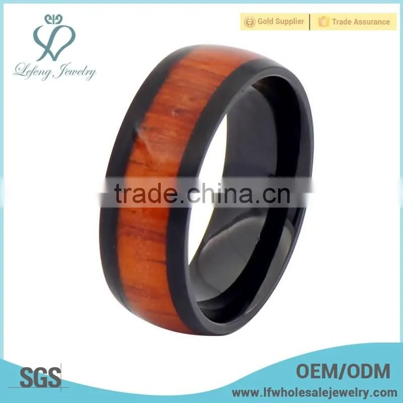 Custom plated black titinium engagement bands with custom wood grain