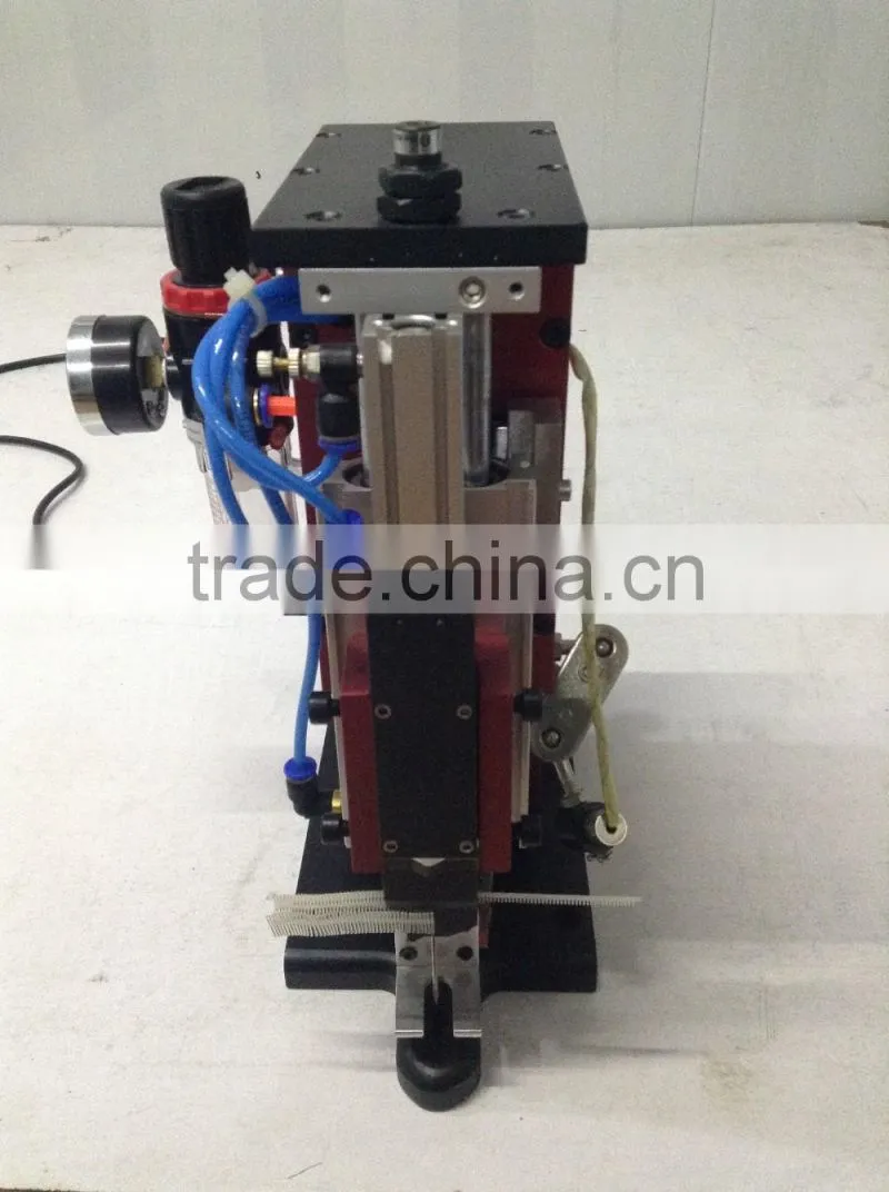 Booster tag pin machine