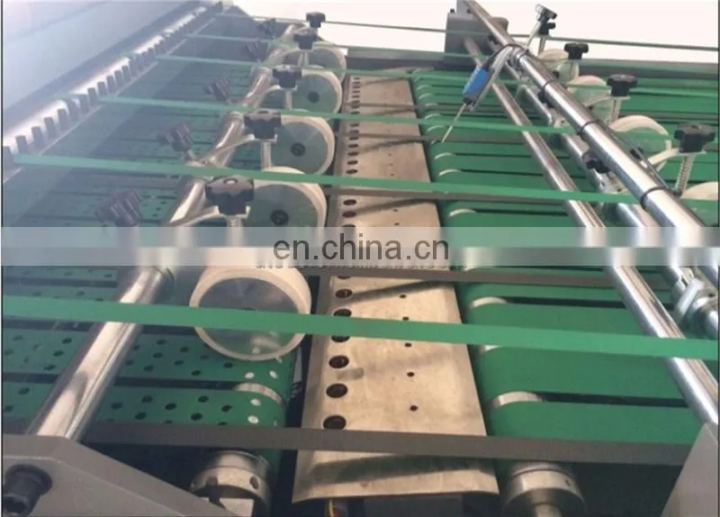 UCM1900A High Speed 4 Roll Automatic Paper cutting slitting Machine with conveyor belt stacker