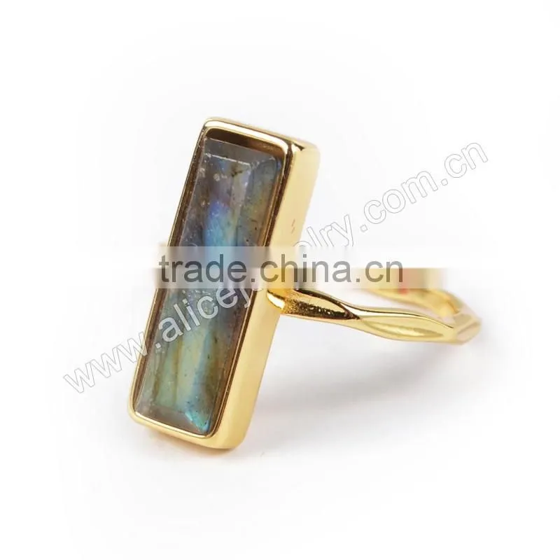 Natural faceted rectangle labradorite gemstone set into a 18k gold bezel ring