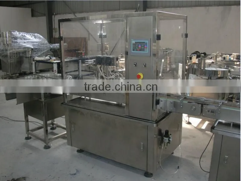 Auto massage oil filling and capping machine