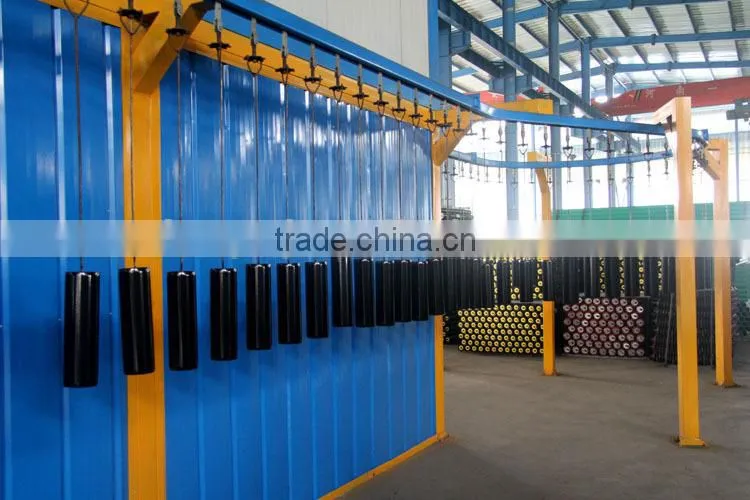 Heat resistant material conveyor trough idler roller