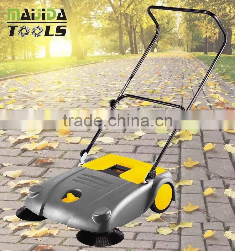 Cleaning walk behind street sweeper MS70