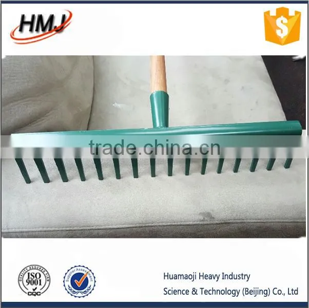 green painted rake head