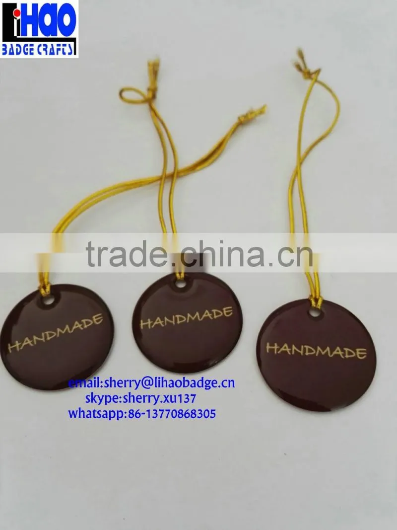 metal hang tag ,epoxy tag with gold bungee cord