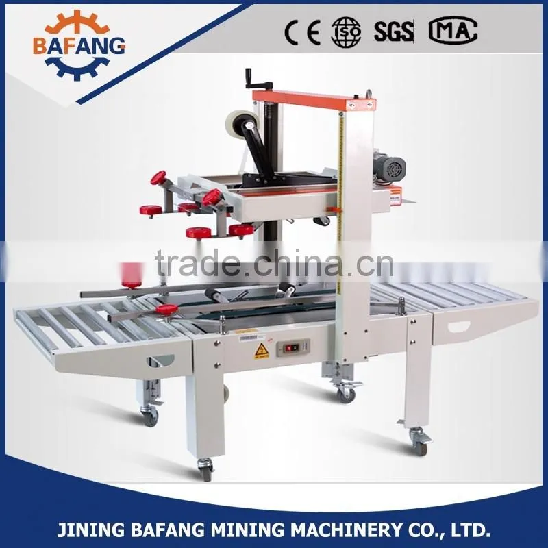 Semi-auto boxes sealing strapping machine