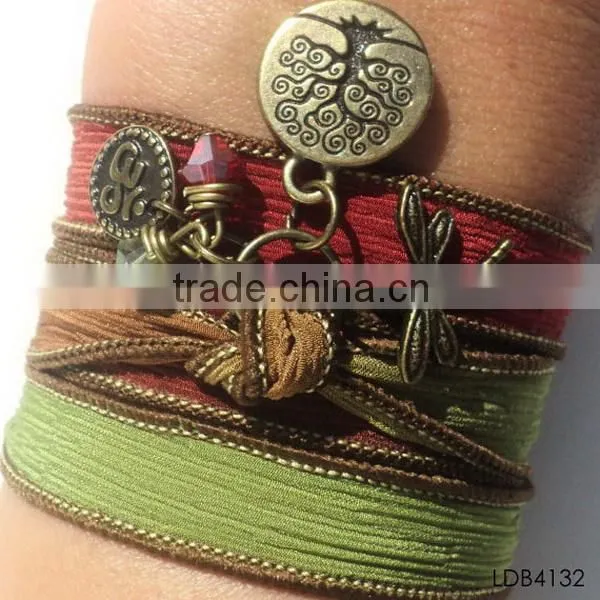 Fashion ribbon bracelet with gold plated dragonfly and tree china supplier