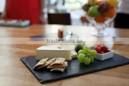 slate serving board for food spread on edible oil