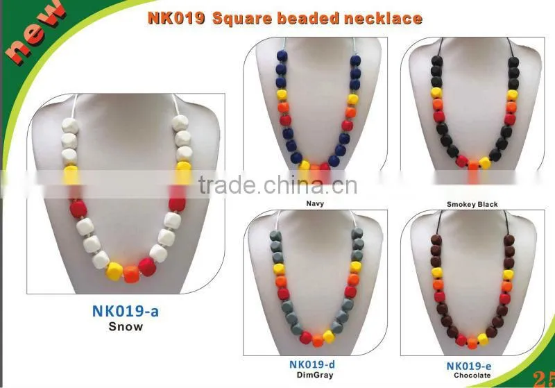 Salmon Orange Chew Silicone Teething Necklaces have a breakaway clasp Make by Food Grade Silicone