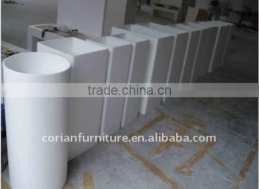 One piece shaped Corian free standing basin