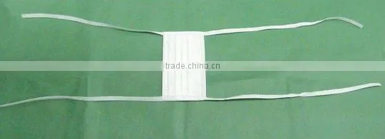 Tie on mask machine
