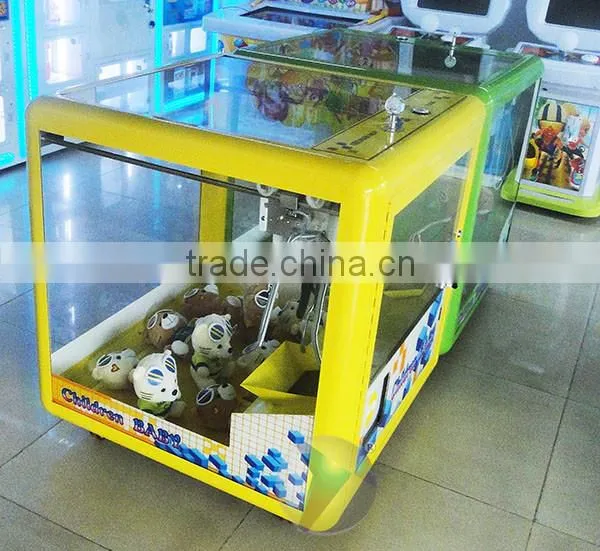 new design toy gift coin-operated game machine for kids / Magic Doll Cube mini toy crane machine