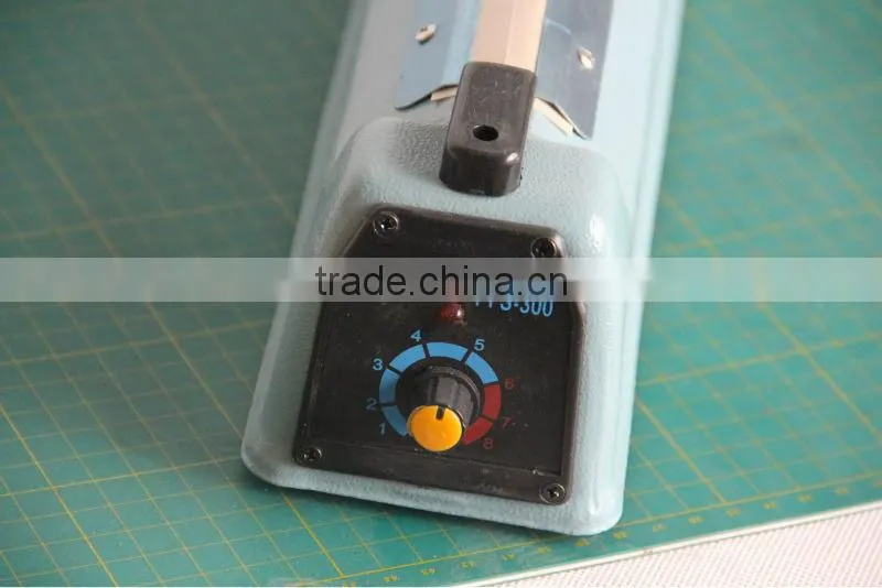 2015 new hot selling professional manual iron body hand heat press sealing machine