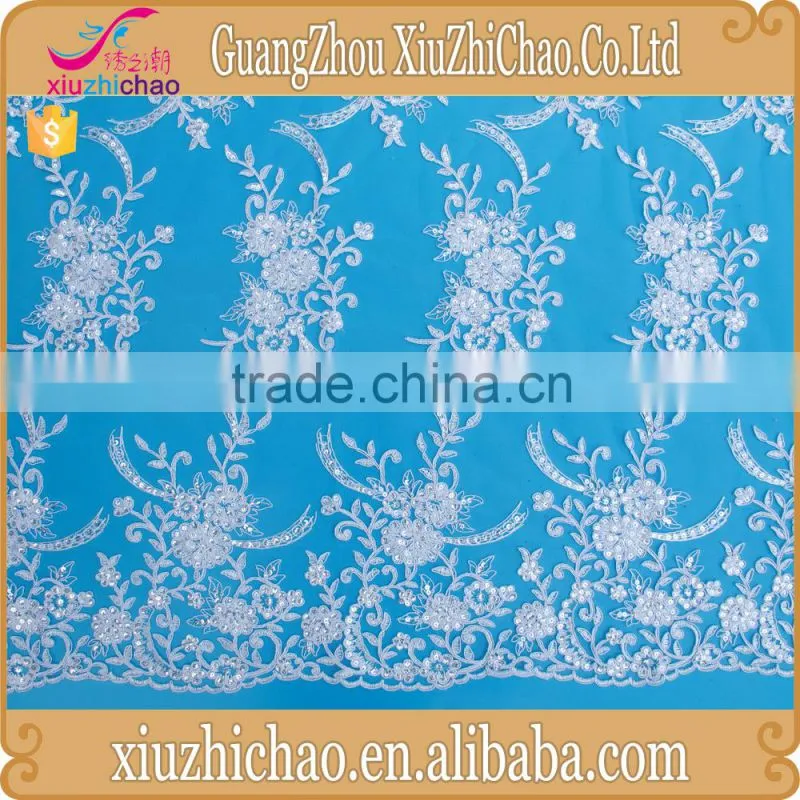 ZP0011-M (11.2)New pattern embroidered designs lace product mesh polyester ivory guipure lace fabric with sequins