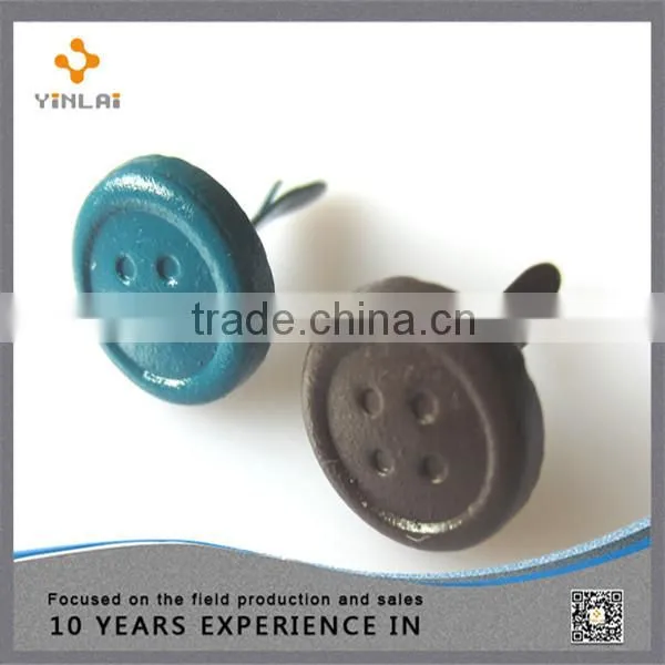 Metal buttons shaped brads