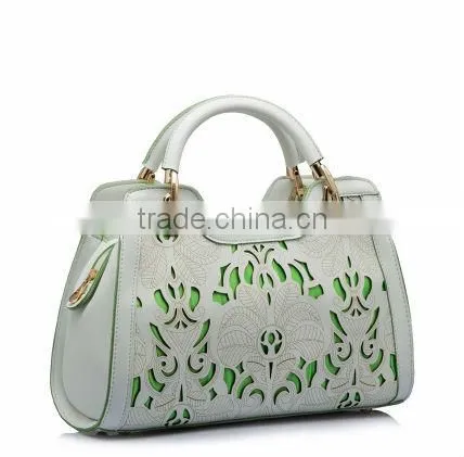 Carve patterns hollow out popular fashion lady handbags 2014