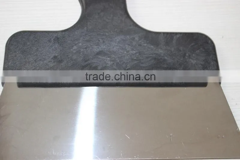 Wall scraper with PC handle