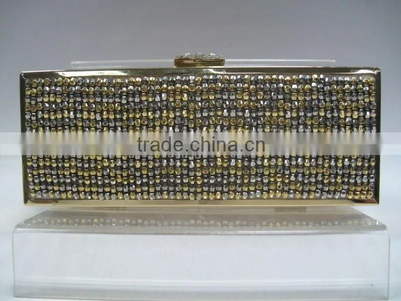handmade stripy beaded clutch bag