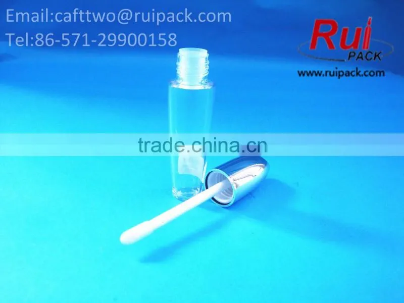 Clear round lip gloss container with shiny silver cap, empty transparent lip gloss tube with brush cap