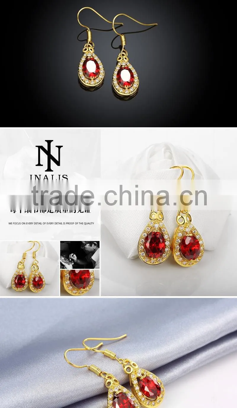 white gold plated ruby tack shape earring