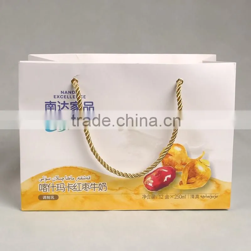New design paper hand bag with deep space and golden handle for health protection products