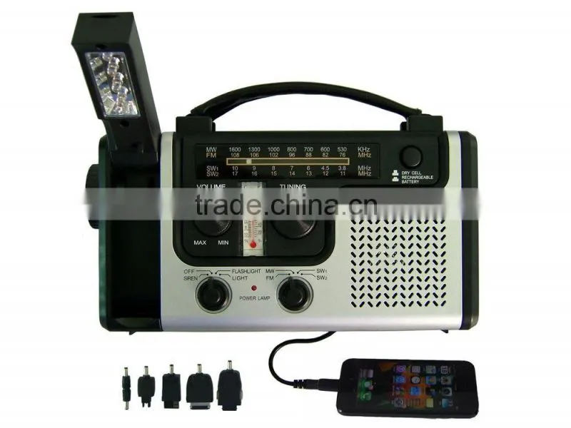 Hand rechargeable with flashlight radio