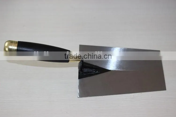 Bricklaying trowel with carbon steel blade
