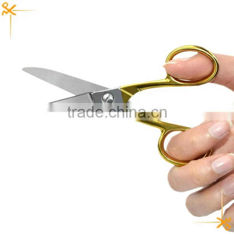 Full stainless steel scissors with gold-plating handle