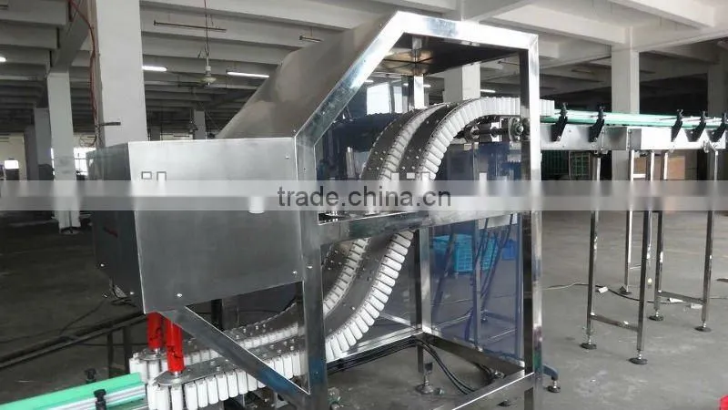 Glass Bottles clip lift conveyor drinks lines conveyor