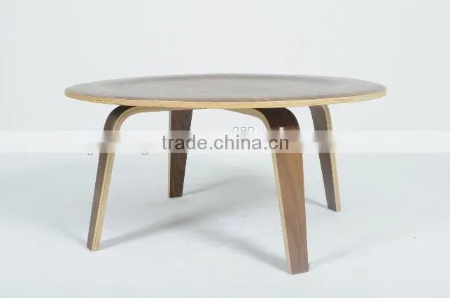Wooden round table with four legs