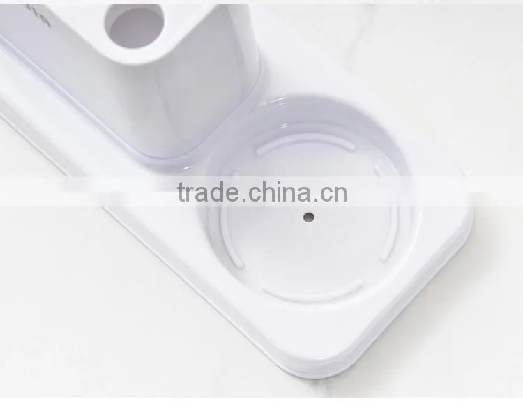 Coupled Toothbrush holder