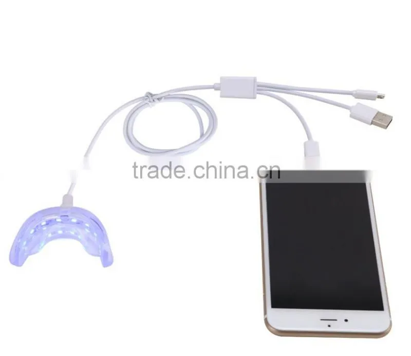 Datahero 16 LED cold light teeth whitening machine using on the phone