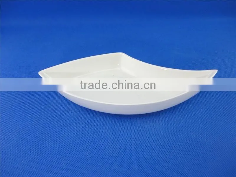 white porcelain peacock fruit dish