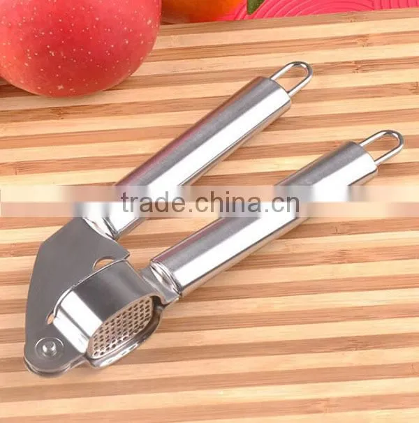 Amazon New food grade approved 100% stainless steel garlic press garlic press and peeler kitchen garlic peeler