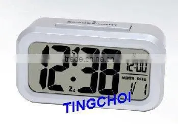 smartlight LCD clock with snooze alarm and calendar