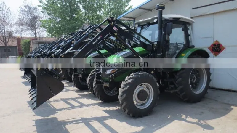Tractor with towable hydraulic backhoe
