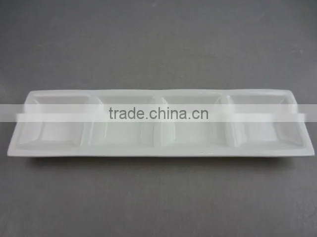 Stock white porcelain four division sauce dish