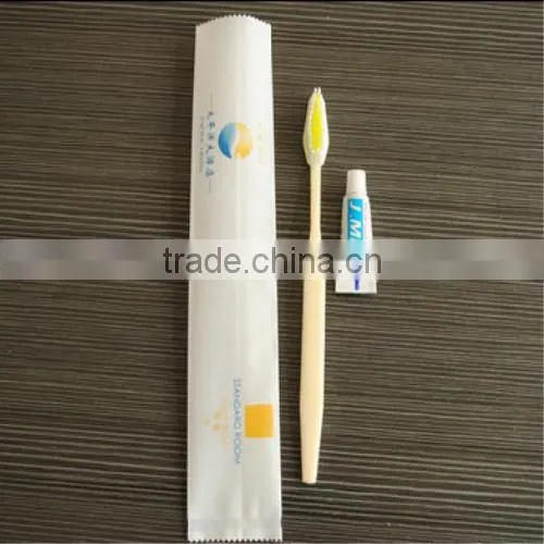 Transparent hotel toothbrush disposable toothbrush with toothpaste