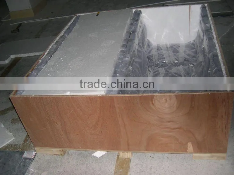 One piece shaped Corian free standing basin