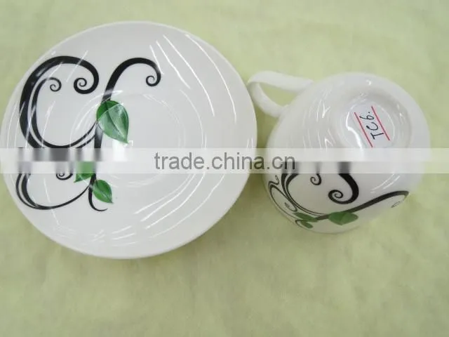 PORCELAIN TEA CUP AND SAUCER