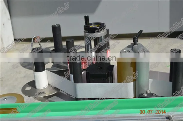 Shanghai BY-TB100 Automatic adhesive bottle labeling machine,labeling machine for canned food,bottle labeling machine price