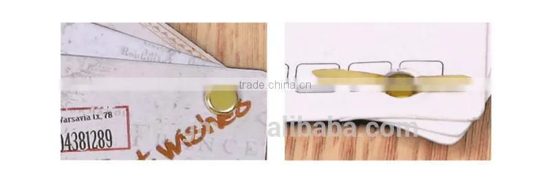 Different Size Golden Paper Fasteners.