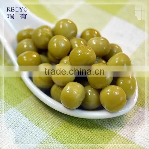new season green peas in salty water