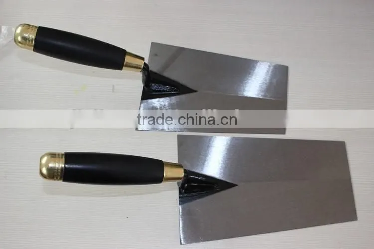 Bricklaying trowel with carbon steel blade