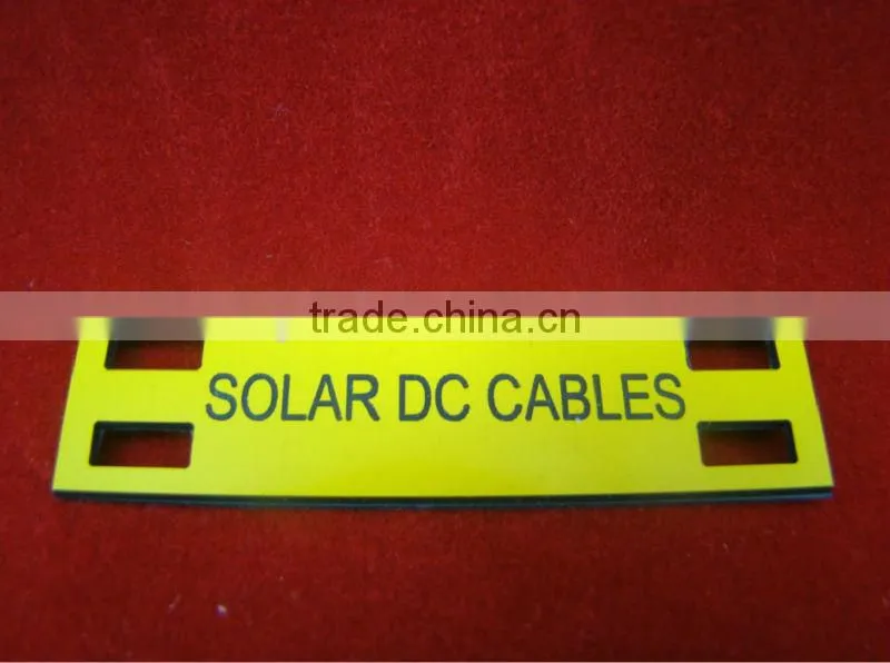 Self adhesive ABS tag with holes