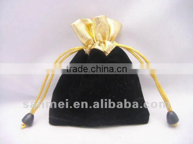 velvet pouch with gold mouth for jewelry